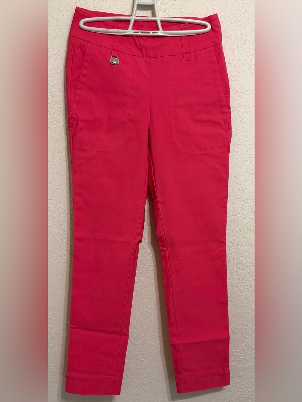 Daily Sports Women's dark melon color skinny pants.